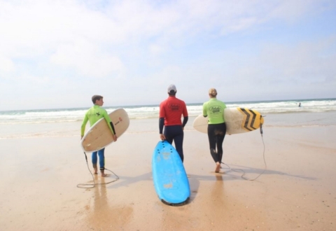 walking to the sea on towan beach escape surf school newquay cornwall