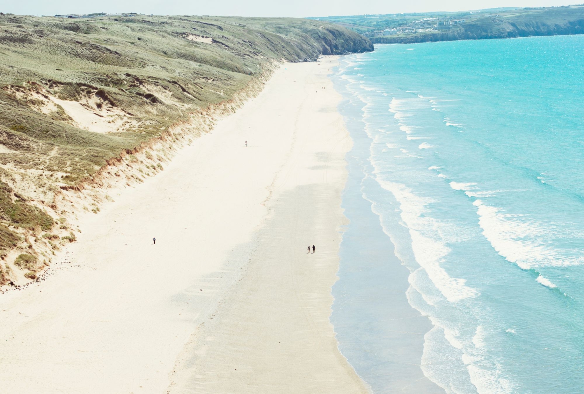 Arial view of perranporth beach on a sunny day